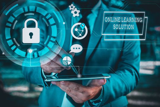 Text sign showing Online Learning Solution. Business photo showcasing use of Electronic access to Educational Curriculum Male human wear formal work suit presenting presentation using smart device