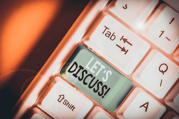 Writing note showing Let S Discuss. Business concept for asking someone to talk about something...