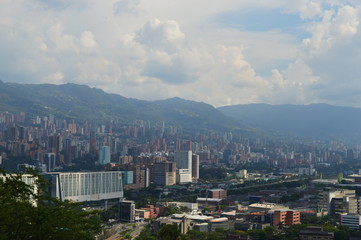 topview of medellin city, colombia, with buildings and shanty towns. contrast between poor and rich