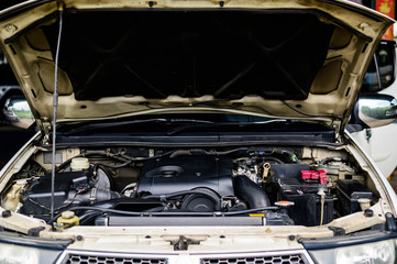 Obraz premium Cars with a diesel engine opening.