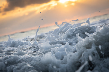 sea foam splash in the pacific ocean