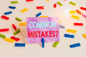 Writing note showing Common Mistakes Question. Business concept for repeat act or judgement...