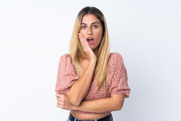 Fototapeta premium Young Uruguayan woman over isolated white background surprised and shocked while looking right