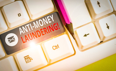 Writing note showing Anti Money Laundering. Business concept for regulations stop generating income...