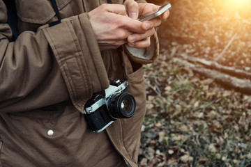 Photographer uses a phone