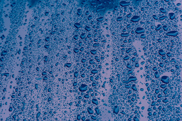 the surface of the water is wet, from the water dew on the blue surface