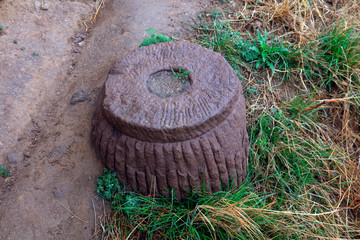 Ancient stone tools were buried in the grass