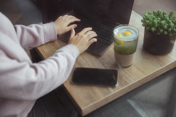 Young cheerful lady outdoors and indoors