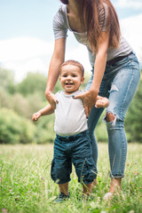 Fototapeta premium Mother play with son in the park.