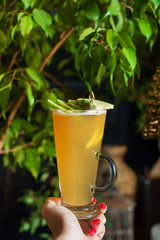 woman with ginger tea  in the hand