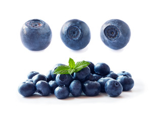 Bilberries isolated. Fresh raw berries isolated on white background. Collection. Blueberries on white background. Set of blueberries from different angles on white. 