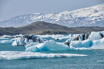 Glacier and calved ice and icebergs at the Jokulsarlon Lagoon in Iceland