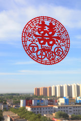 Double Happiness word Paper-cut and High-rise Building