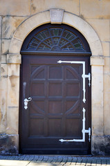 Entrance in ancient building. The date 1818 on top of door.