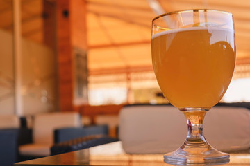 Beer glass on the bar counter.