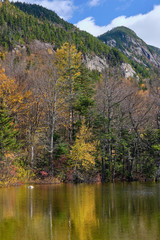 The granite of New Hampshire White Mountains along the shore of Echo Lake