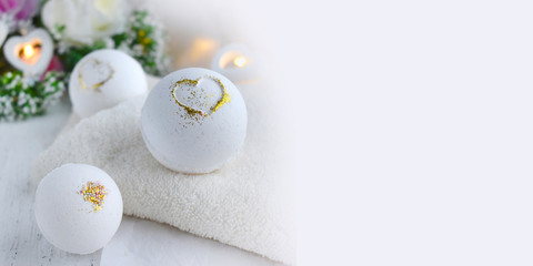 Mock up beautiful spa composition. Bath bombs on light romantic background. Love or health...