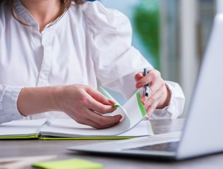 Woman hands working on computer at desk