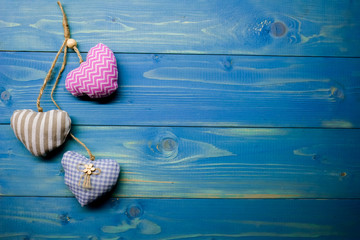 Heart from cloth on wood desk. Valentines day background
