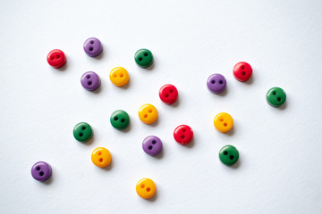Colorful buttons on white background