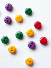 Colorful buttons on white background