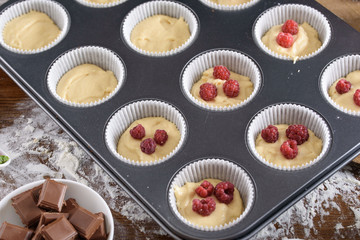 The process of making desserts. Cream cakes, muffins, cookies, groceries. The kitchen and confectioner makes desserts.