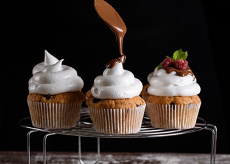 The process of making desserts. Cream cakes, muffins, cookies, groceries. The kitchen and confectioner makes desserts.