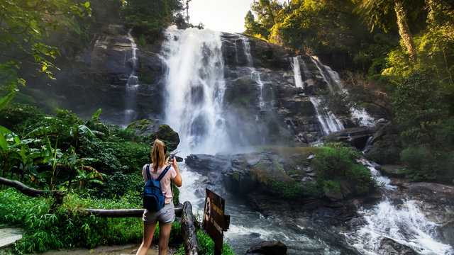 tourist with Wachirathan Falls Waterfall in Chang Mai Thailand