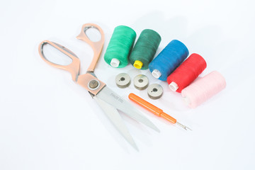 spools of thread and scissors