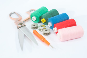 spools of thread and scissors