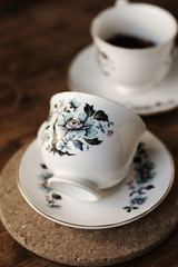 Tea cups and saucers on a rustic wooden table