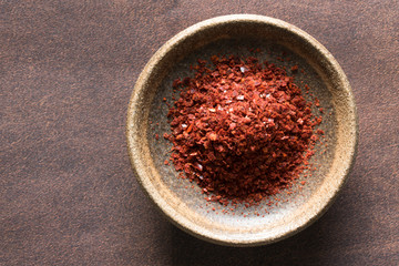 Ground Aleppo Peppers in a Bowl