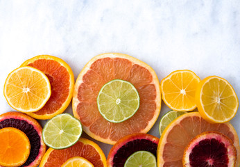 Fototapeta na wymiar Citrus fruits lemon , lime , orange and grapefruit slices on white background 