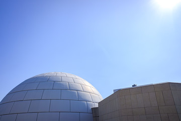 Spherical dome against the blue sky