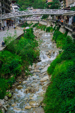 Aguas Calientes town Machu Picchu town white bridge