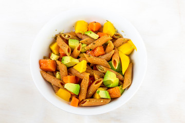 Red Papaya, avocado and mango with Basil paste lentil pasta