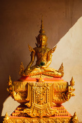 golden buddha statue in temple thailand