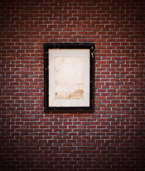  Old picture frame on brick wall,3d rendering