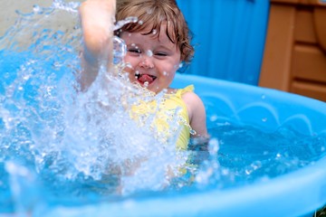 little girl in swimming pool