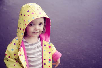 little girl in the rain