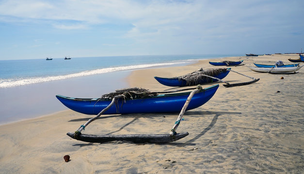 Fishing boats on a beach near Batticaloa, Sri Lanka
