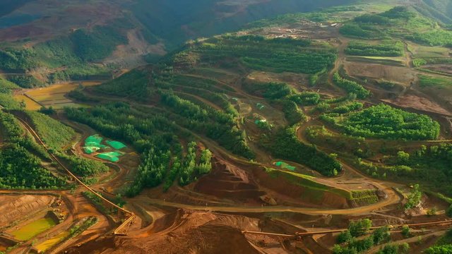 Climate change, Sumitomo Corporation layered open pit mine in Taganito, Philippines
