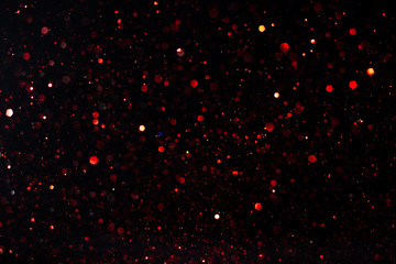 Beautiful bokeh on an abstract black background.