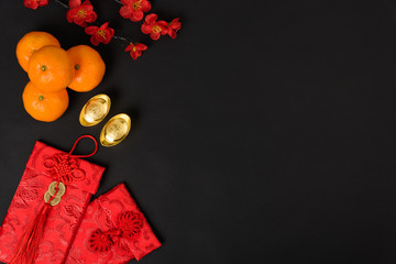 Chinese new year festival concept, flat lay top view, Happy Chinese new year with Red envelope and gold ingot