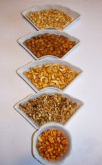 mixed nuts in a snack tray for a party