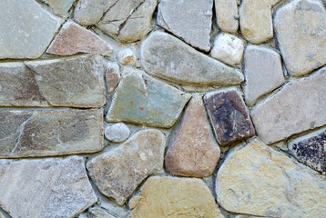 Background of coarse clastic structure from pebbles of sedimentary rocks close-up.