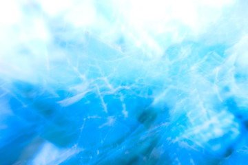 The bright blue leaf background.