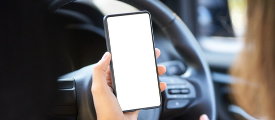 Phone mockup inside car. Travel driver seach maps. Empty screen. Vehicle navigation location. Hand...