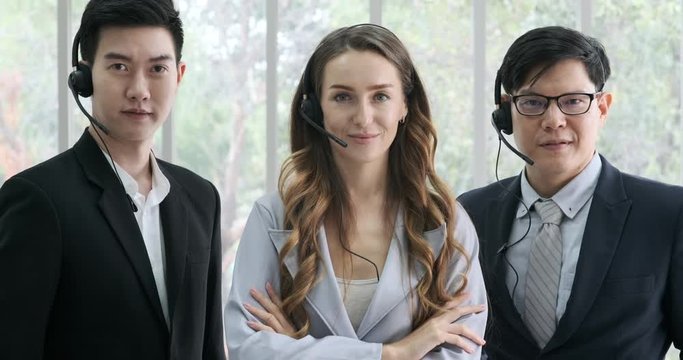 Portrit of business men women call center customer support operater team stand at workplace