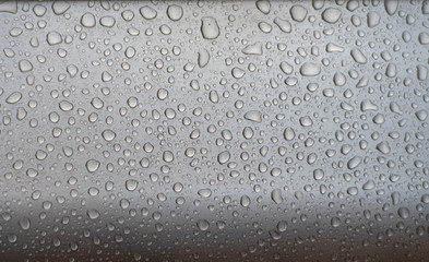Many Water Raindrops Gathered on Glass